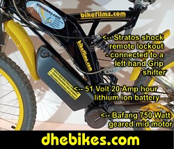 Custom made to order Womens electric downhill mountain bike by Pinnacle Innovations side view showing the Stratos rear air/ oil/coil shock with remote lockout and the Bafang 750 Watt mid mount electric motor kit with 20 Amp hour lithium ion 51 Volt battery.
