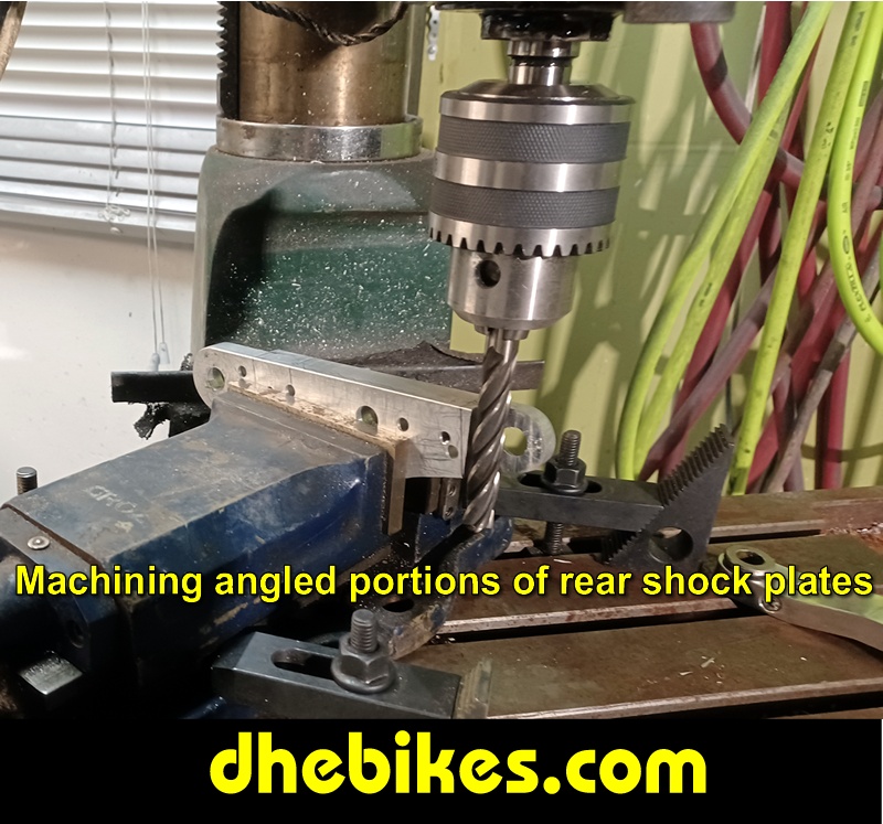 Pinnacle Innovations picture showing machining in progress of the angled tapers for two Norco custom downhill bike's long travel rear suspension linkage plates made from 6061 aircraft aluminum.
