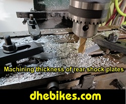 Pinnacle Innovations picture showing machining in progress of the thickness for two Norco custom downhill bike's long travel rear suspension linkage plates made from 6061 aircraft aluminum.
